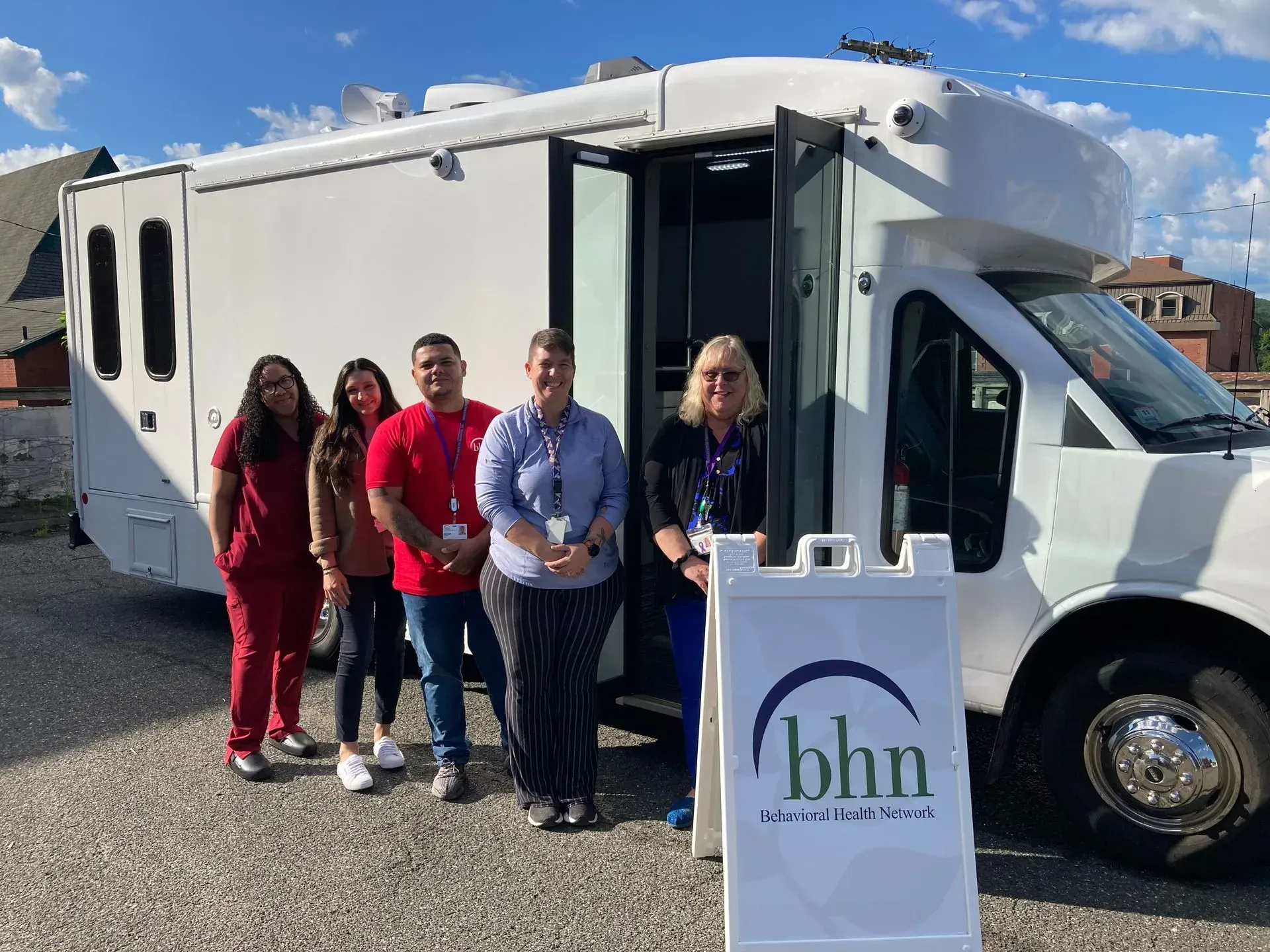 BHN staff standing next to the mobile methadone van