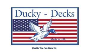Ducky-Ducks logo with American flag background, flying dove, and “Made in USA” text