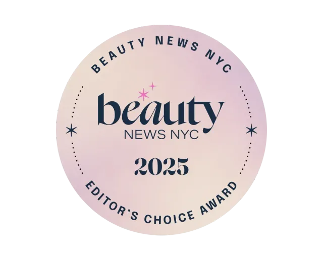 Circular "Beauty News NYC 2025 Editor's Choice Award" badge on a soft, gradient pink background.