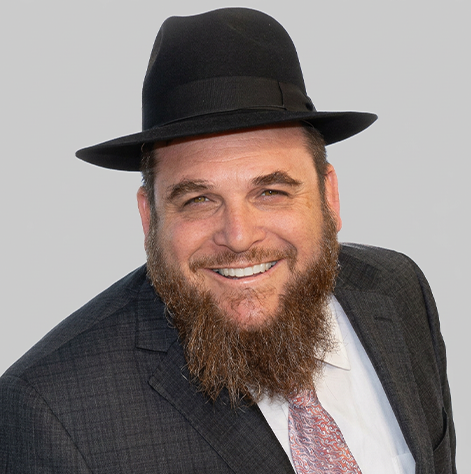 Portrait of smiling man wearing black hat
