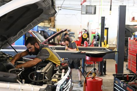 Mechanic Working on Engine | Auto Repair At The Hive