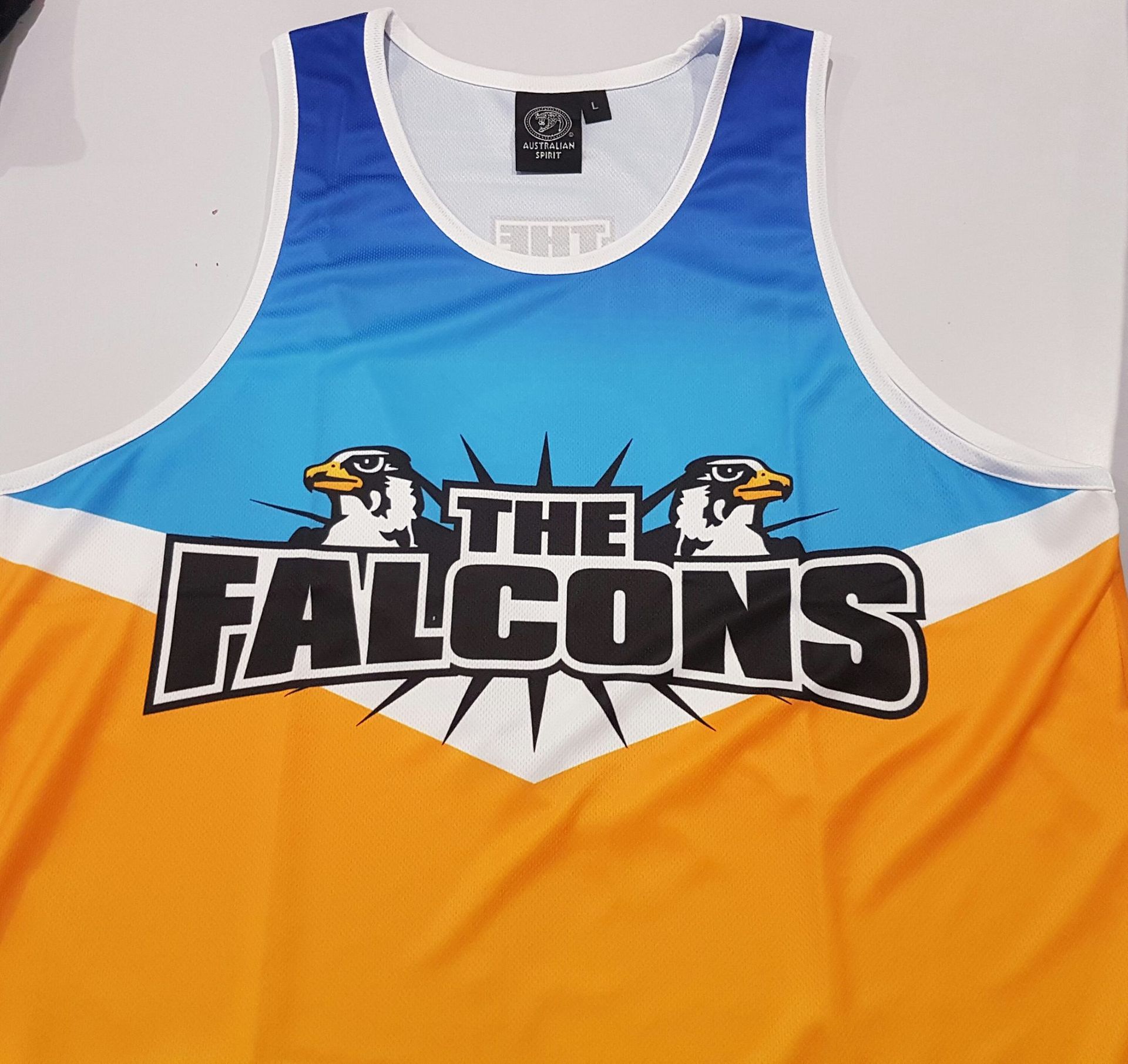 A Blue And Orange Tank Top That Says The Falcons — Sportstar Screenprinting in Kingaroy, QLD