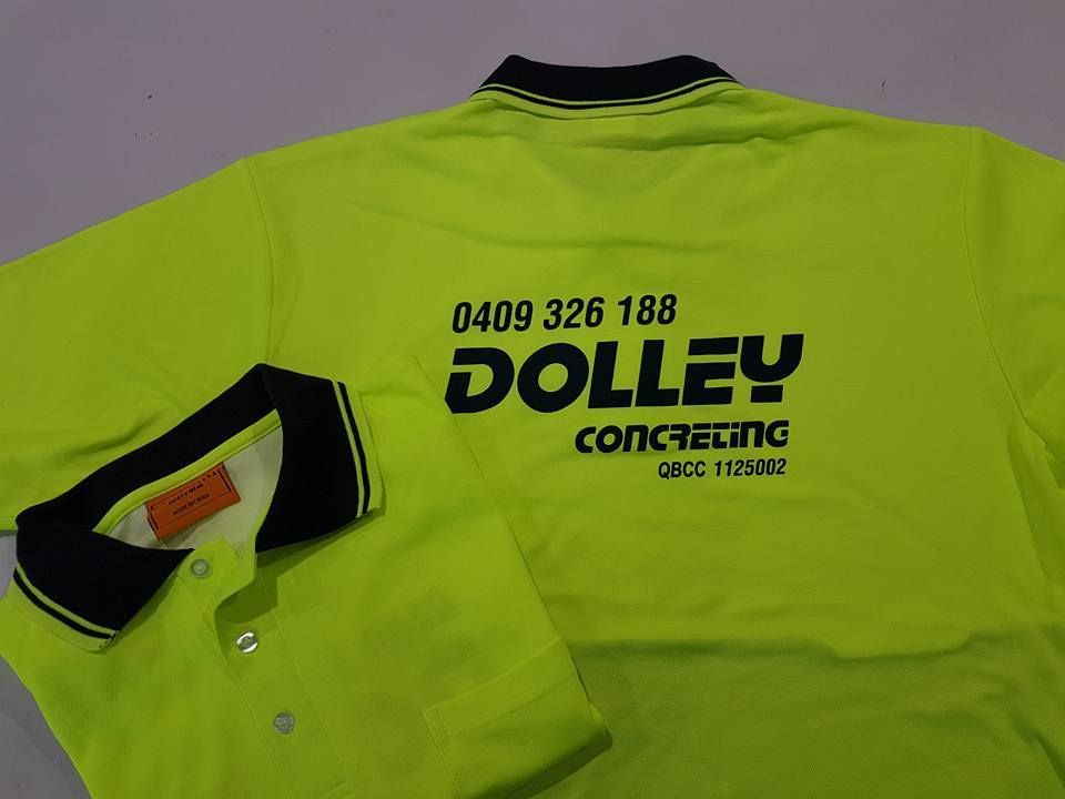 A Yellow Polo Shirt With The Word Dolley Embroidered On It — Sportstar Screenprinting In Newtown, QLD