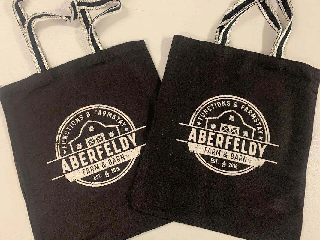 Two Black Tote Bags With The Word Aberfeldy On Them — Sportstar Screenprinting In Newtown, QLD