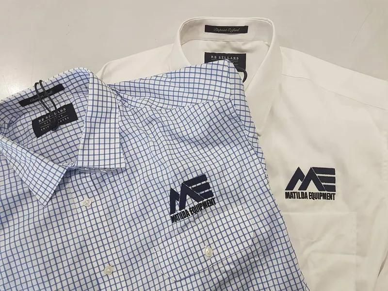Two Polo Shirts With The Word Matilda Equipment Embroidered On Them — Sportstar Screenprinting in Dalby, QLD