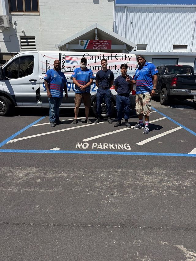Capital City Comfort team and Coast Guard personnel outside Air Station Sacramento
