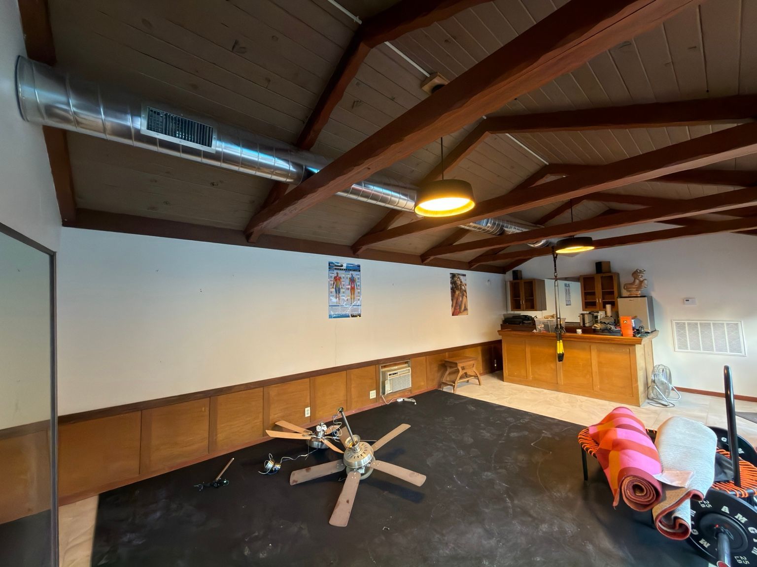 Completed exposed spiral duct run — Capital City Comfort spiral duct installation