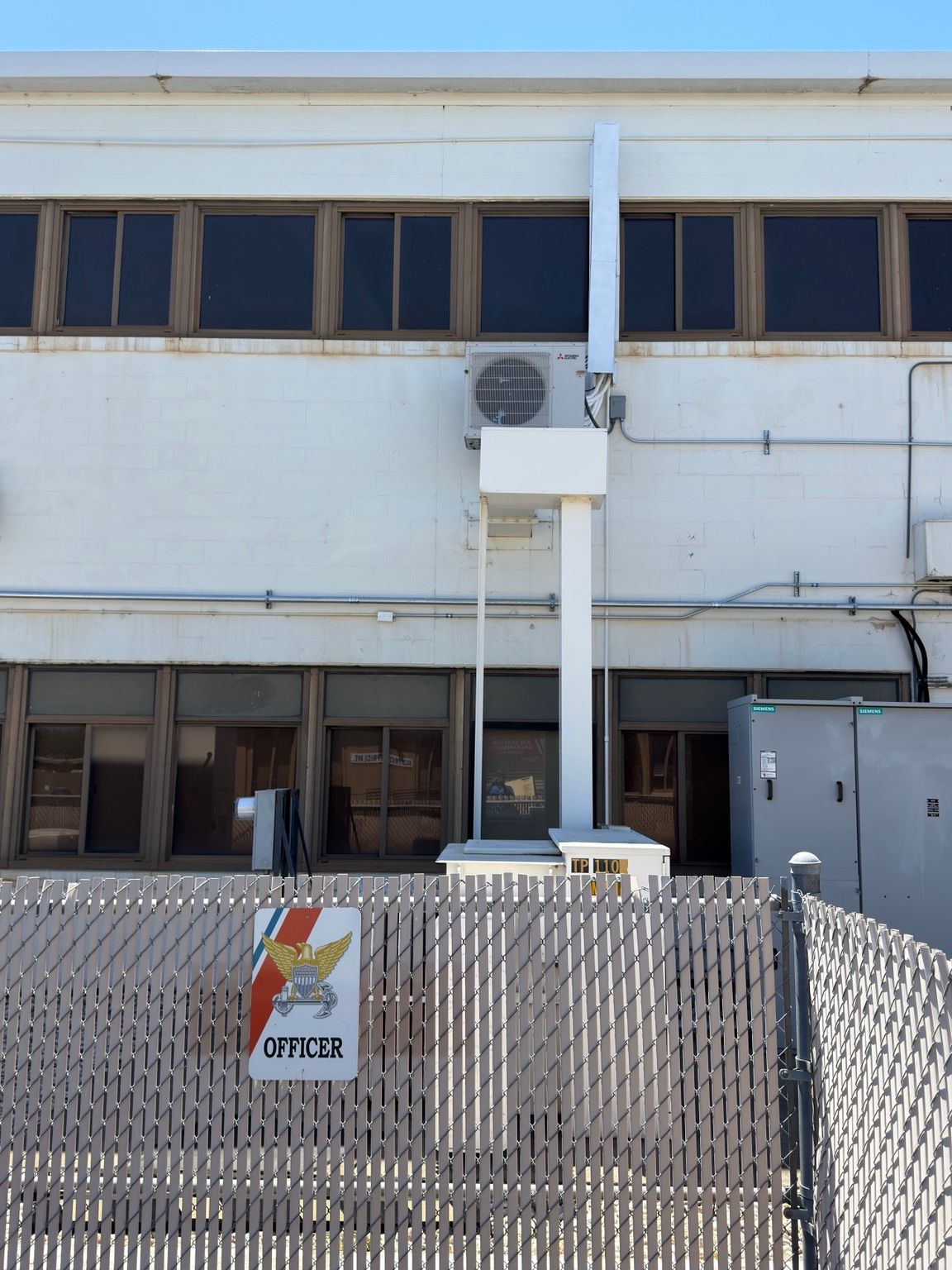 Outdoor HVAC installation on the exterior of U.S. Coast Guard Air Station Sacramento