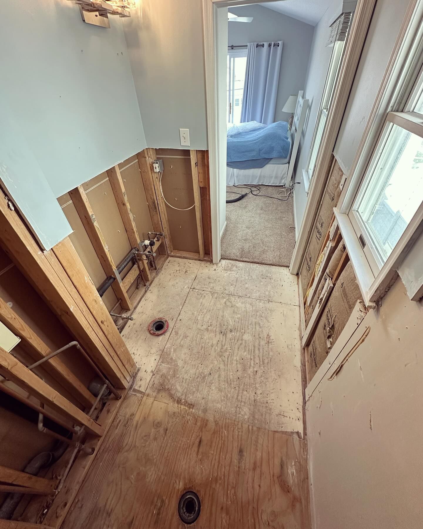 A hallway in a house that is being remodeled