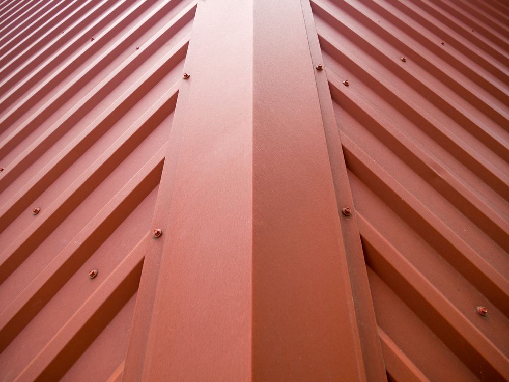 Red Metal Roof Corner Detail — Coffs Coast Roofing In Mullaway, NSW