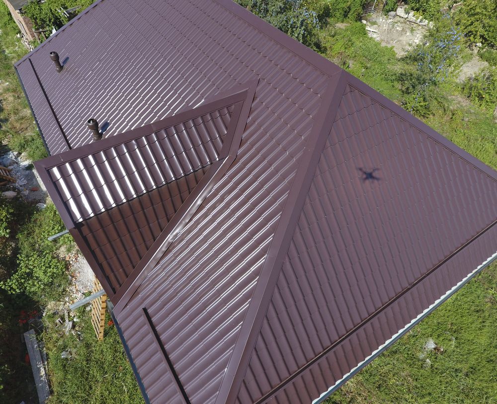 Brown Metal Roof on a Building, Angled View, Outdoors — Coffs Coast Roofing In Grafton, NSW