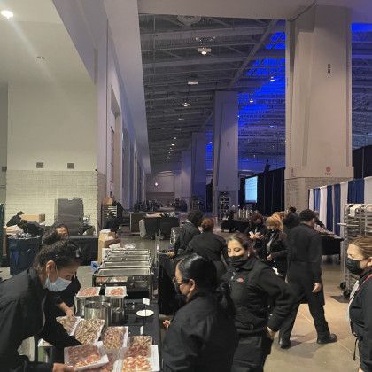 Catering staff preparing food