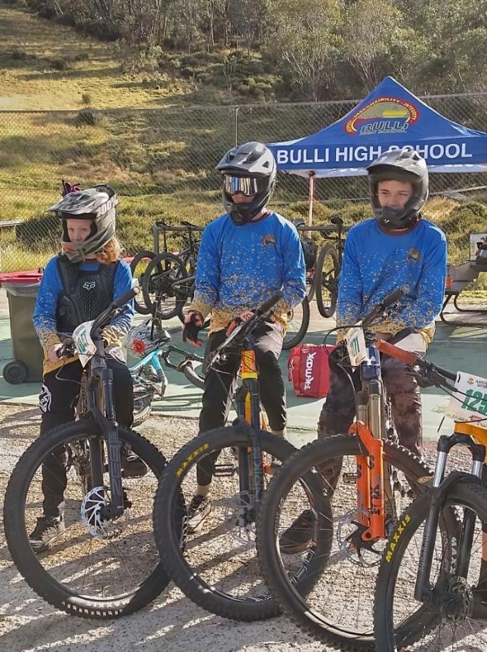 Biker Wearing Helmets With Their Bikes — Promotional Apparel In Kiama, NSW