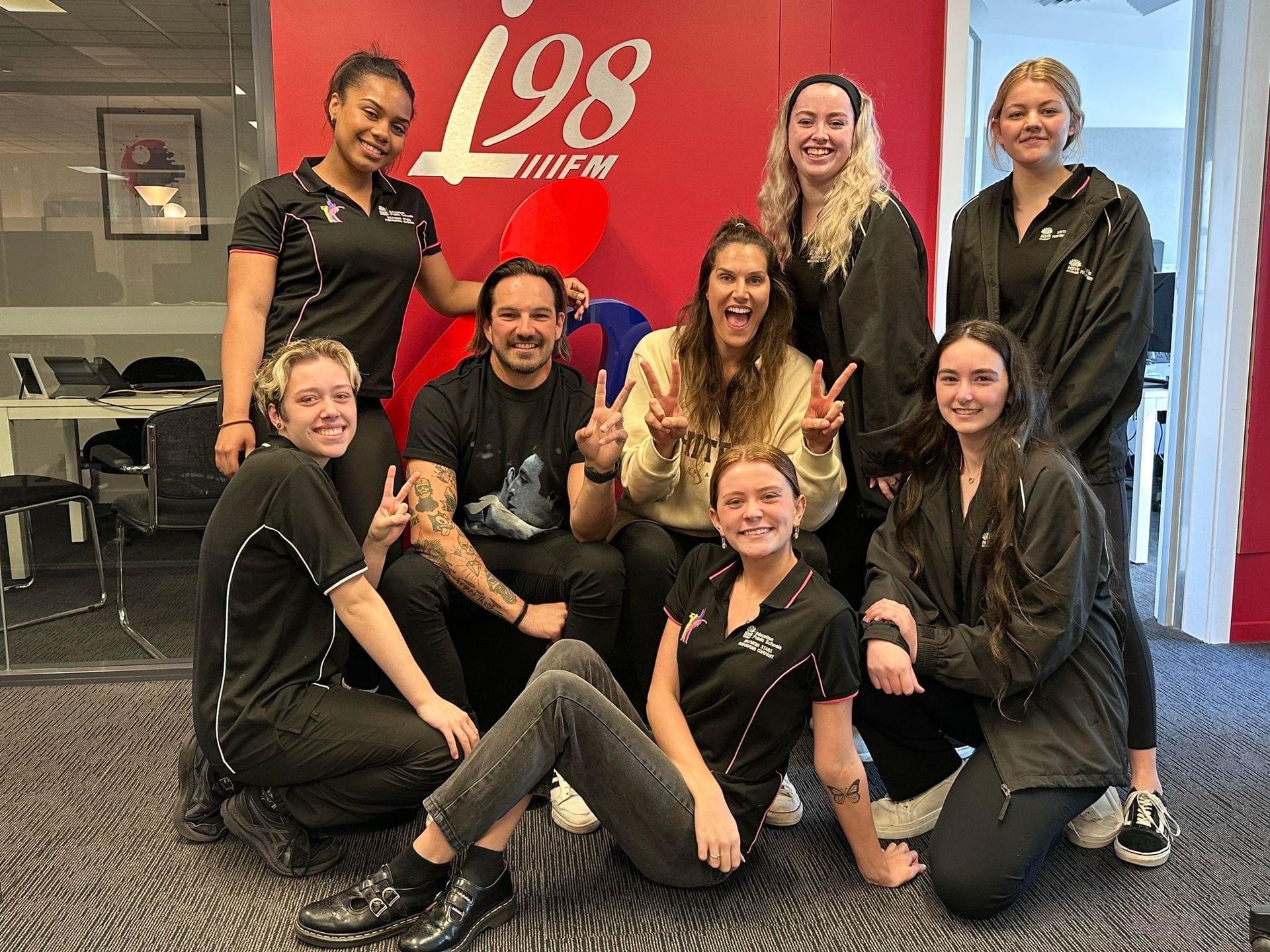 People Wearing Black Uniforms — Promotional Apparel In Woonona, NSW