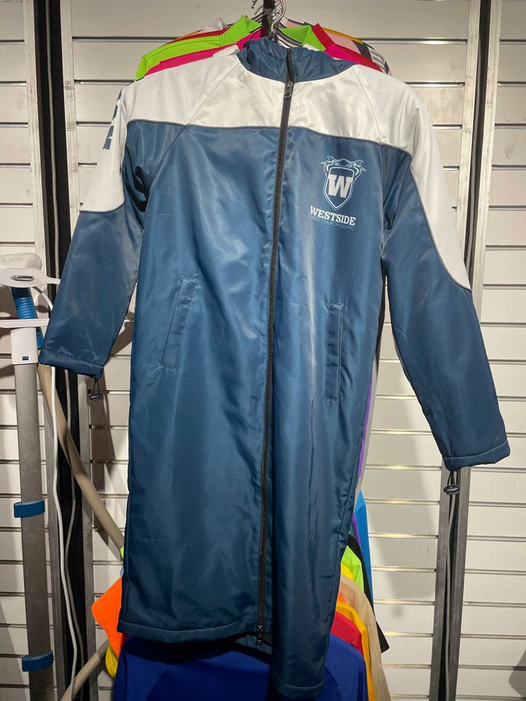 Stylish Jackets Displayed in the Cabinet — Promotional Apparel In Woonona, NSW