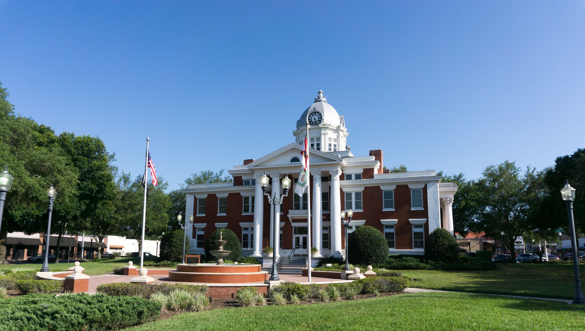 A large brick building with a dome on top of it