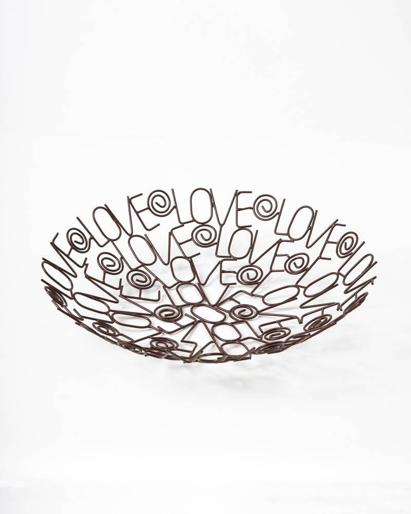 A decorative bowl made of brown wire, with the word