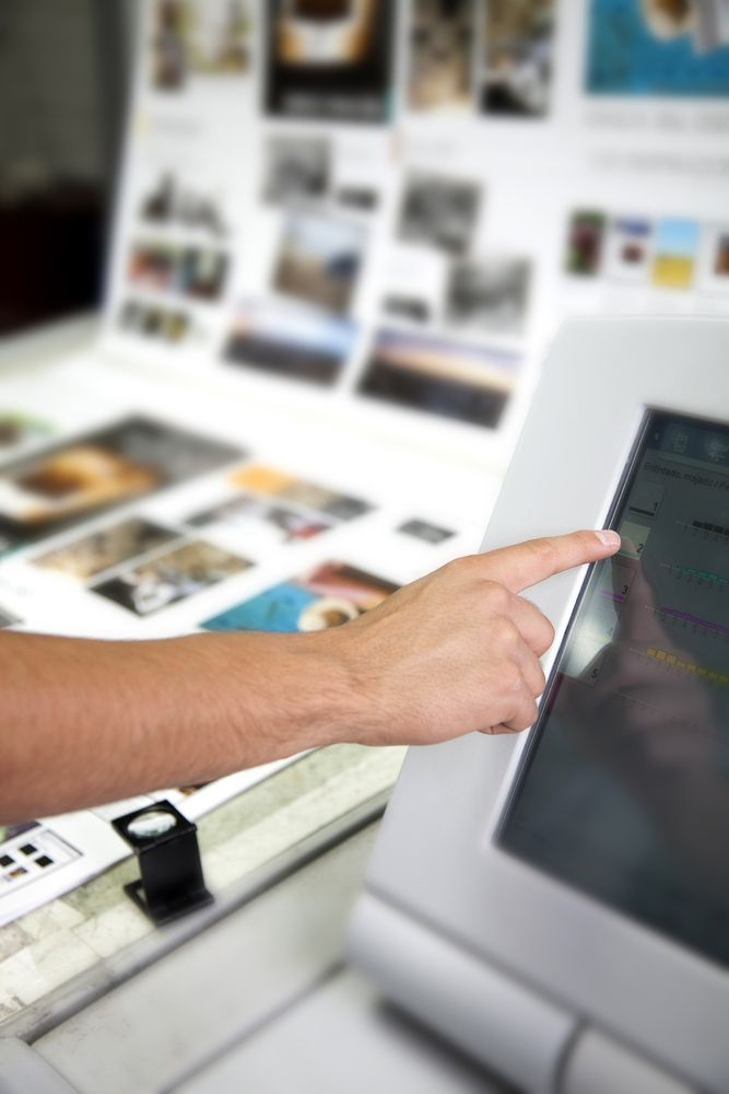 Man Pointing On The Monitor — Graphic Designer In Airlie Beach, QLD