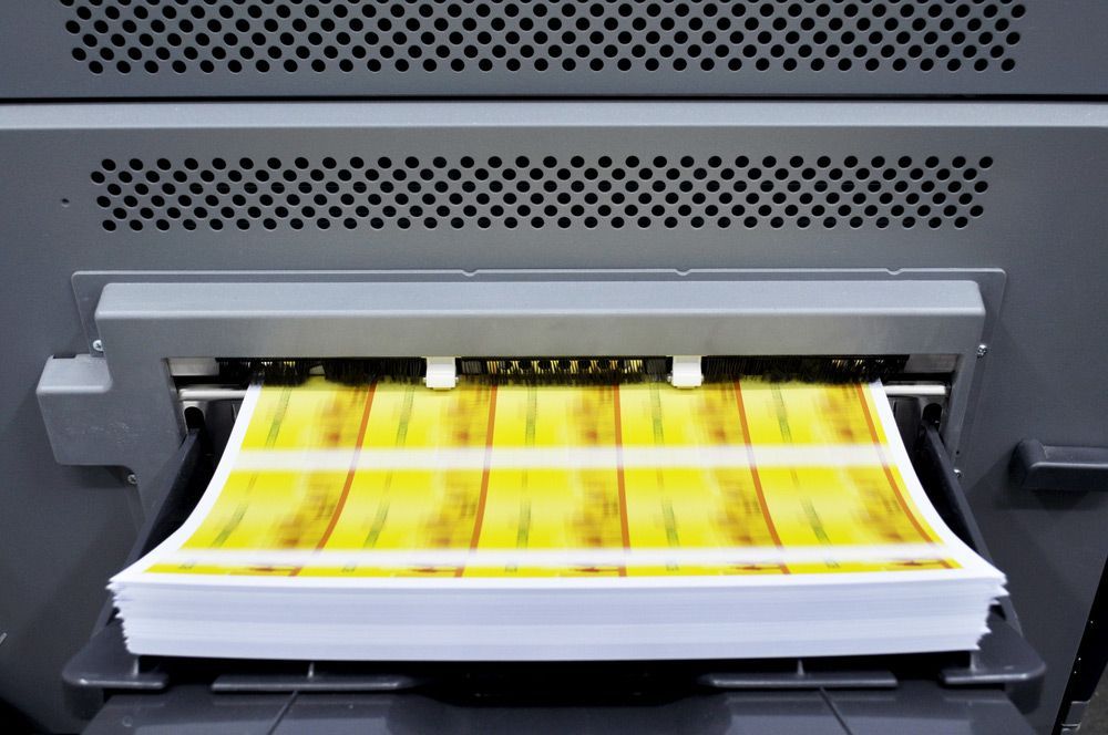 Digital Printing Machine During Production — Graphic Designer In Airlie Beach, QLD