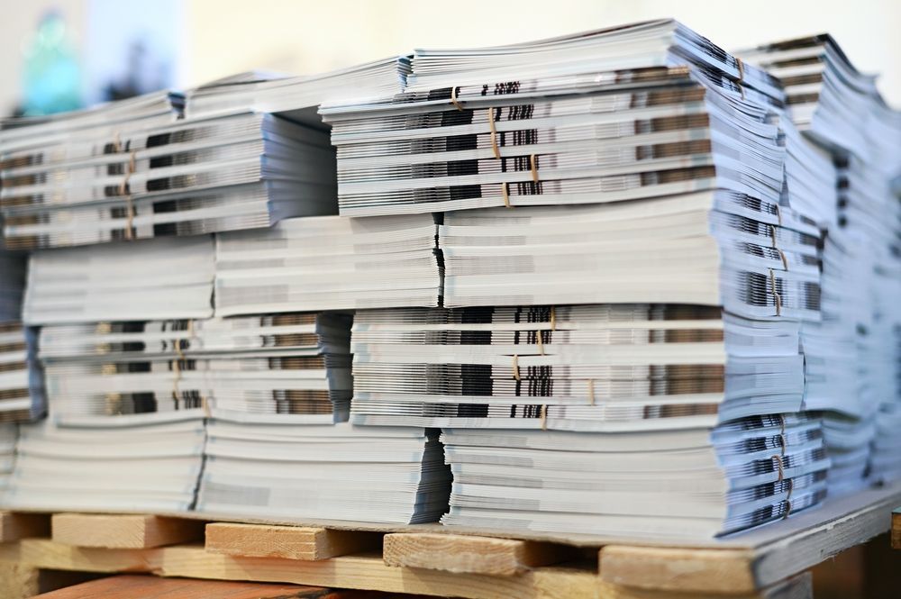 Bundled Of Docket Books — Graphic Designer In Airlie Beach, QLD
