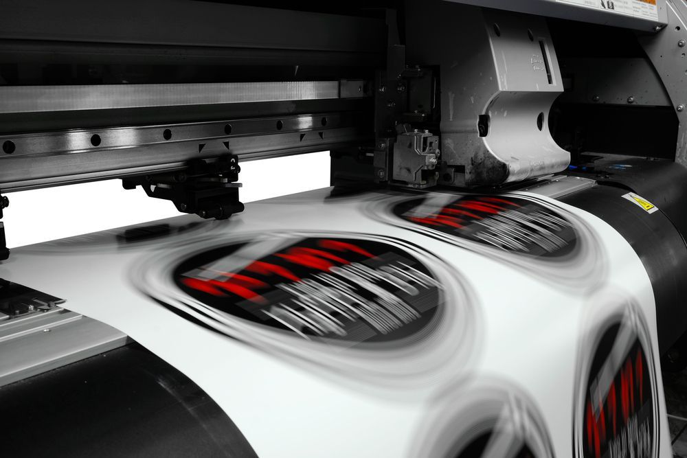 Printing Stickers With Red And White Fonts With Black Background — Graphic Designer In Nowra, QLD