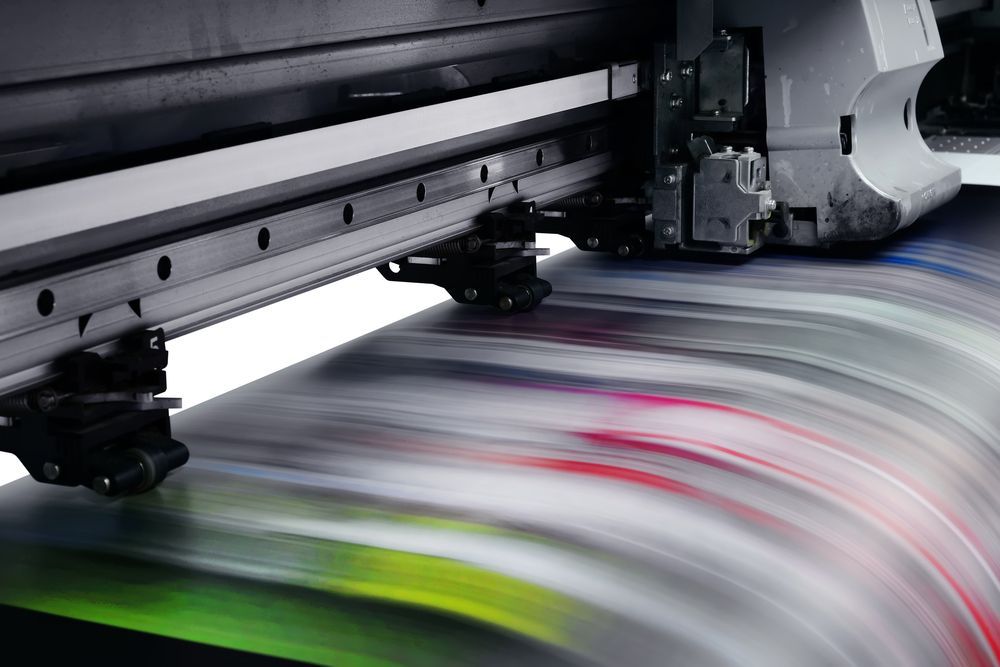 Printing Machine At High Speed — Graphic Designer In Bowen, QLD