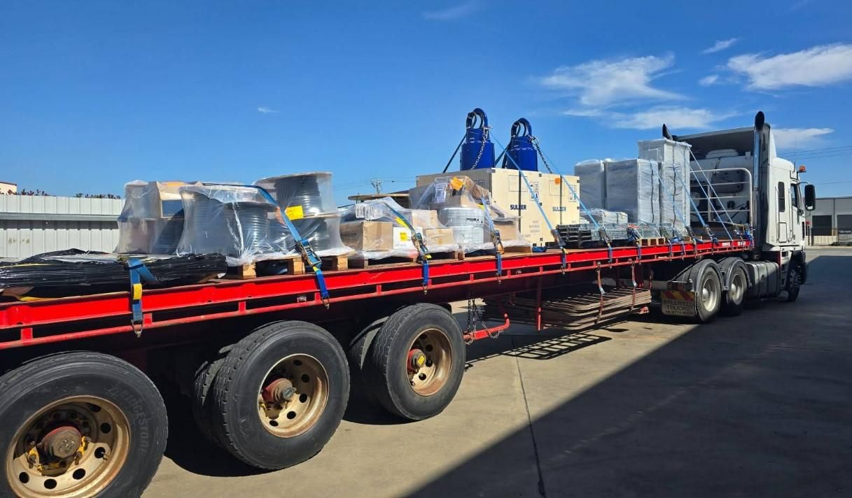 A Semi Truck is Carrying a Load of Boxes and Equipment — Goulburn Transport In Southern Highlands, NSW