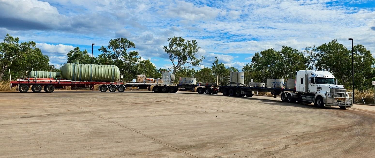 A truck with long trailer long is parked — Goulburn Transport In Sydney, NSW