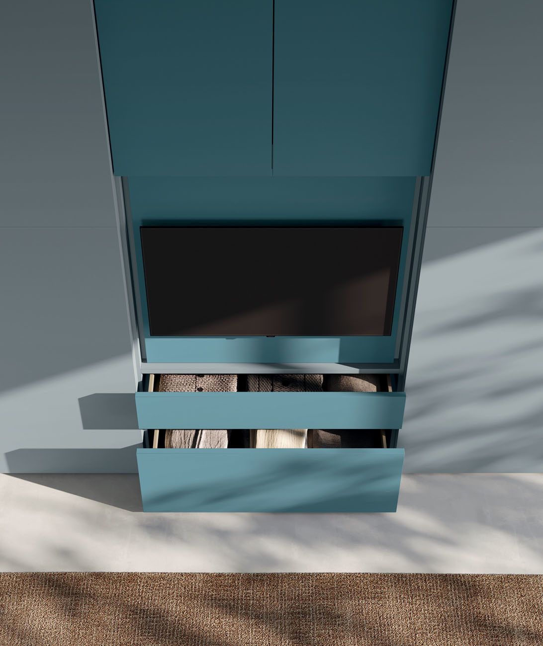 Distributore automatico blu con display scuro e vano inferiore aperto, posizionato su un pavimento in cemento.
