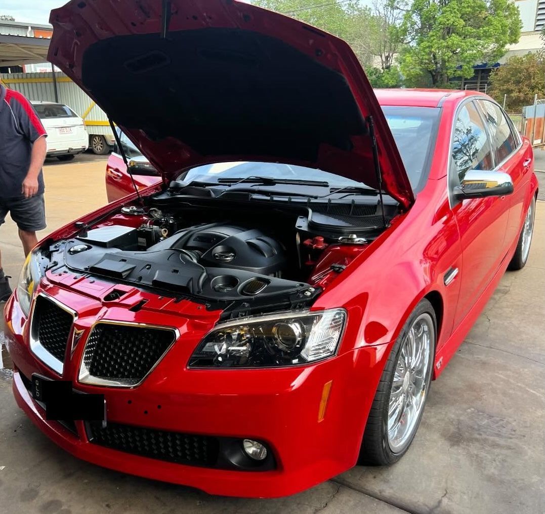 Red Car With Hood Open, Showing Engine — Bundaberg Radiator and Mechanical Service in Bundaberg East, QLD