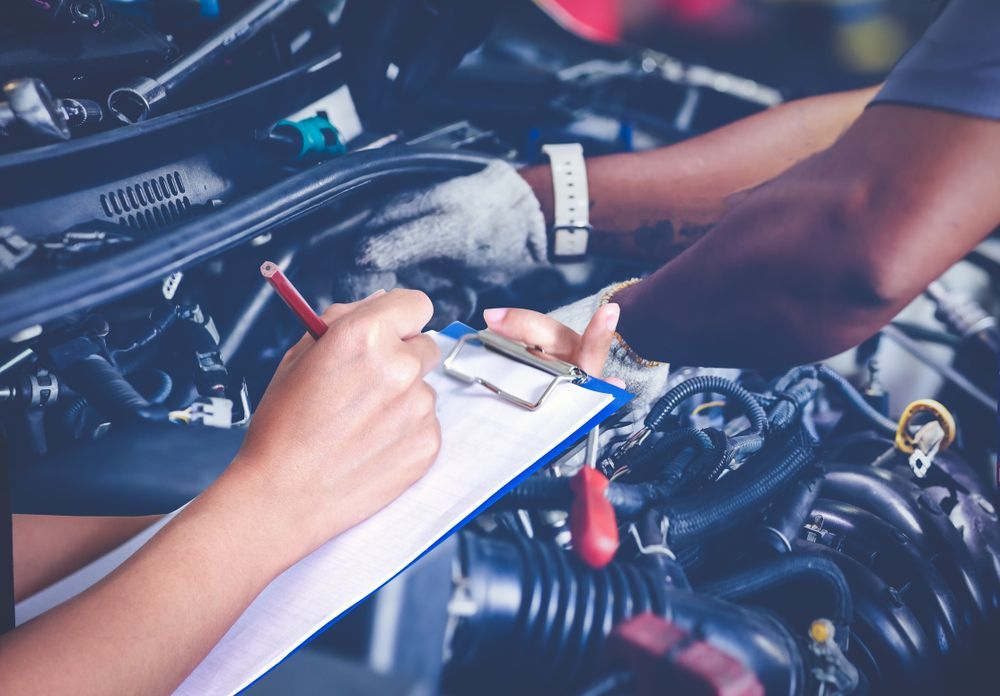 Mechanic Working on Car Engine — Bundaberg Radiator and Mechanical Service in Bundaberg East, QLD