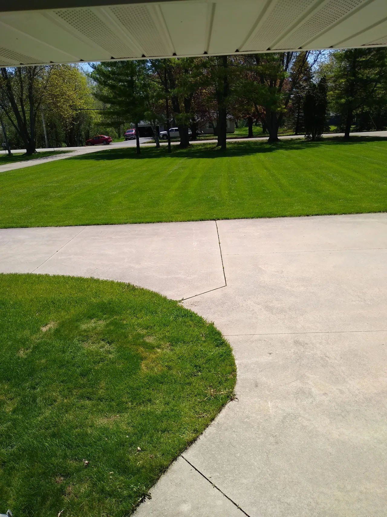 Driveway with Clean Lawn — Appleton, WI — 2 bud’s n a bucket