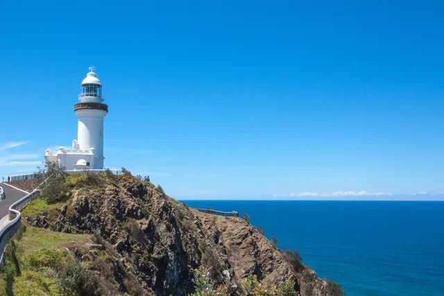 Byron bay light house with blue ocean in the background