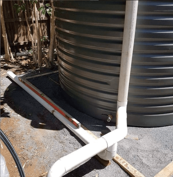 Rainwater tank installation at a Ballina home with connected plumbing