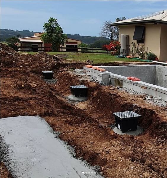 Plumbers working — Cape Byron Plumbing in Mullumbimby, NSW