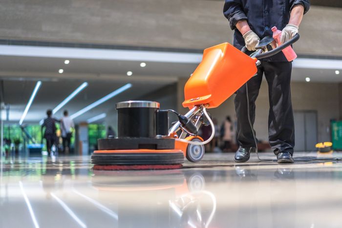 cleaning floor with machine