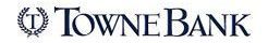 A logo for towne bank with a laurel wreath on a white background.