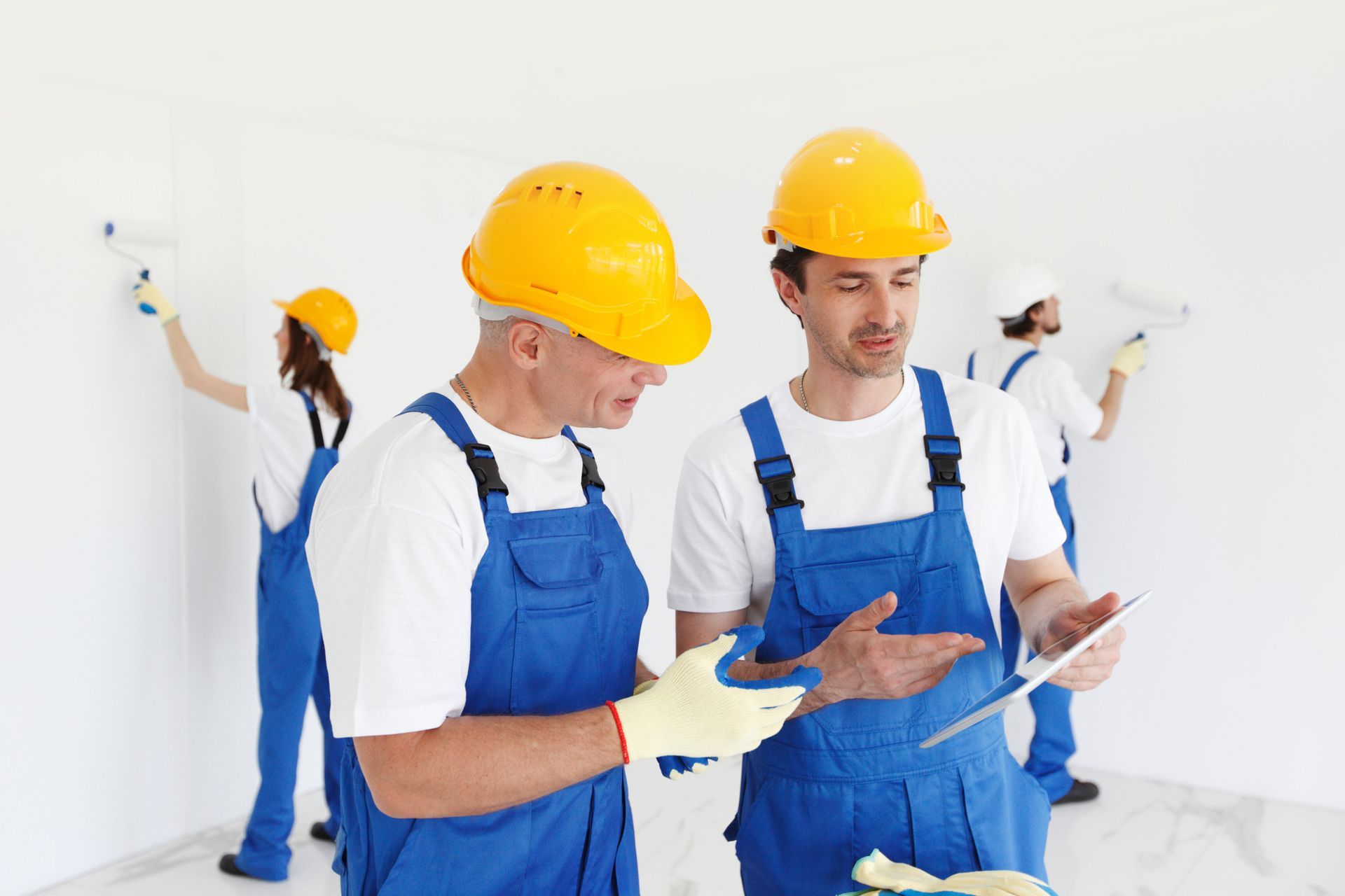 Two Workers Having a Discussion — Latrobe, TAS — Clarkes Painting Services Pty Ltd