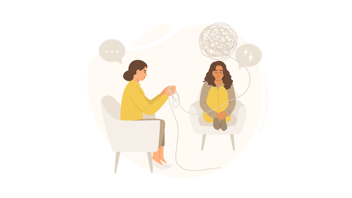 Therapist in yellow top and client untangling thought bubble.