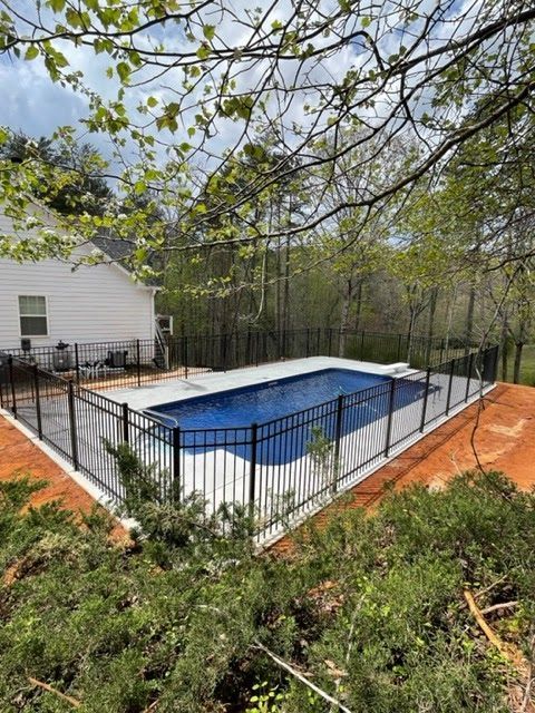 metal fence around pool