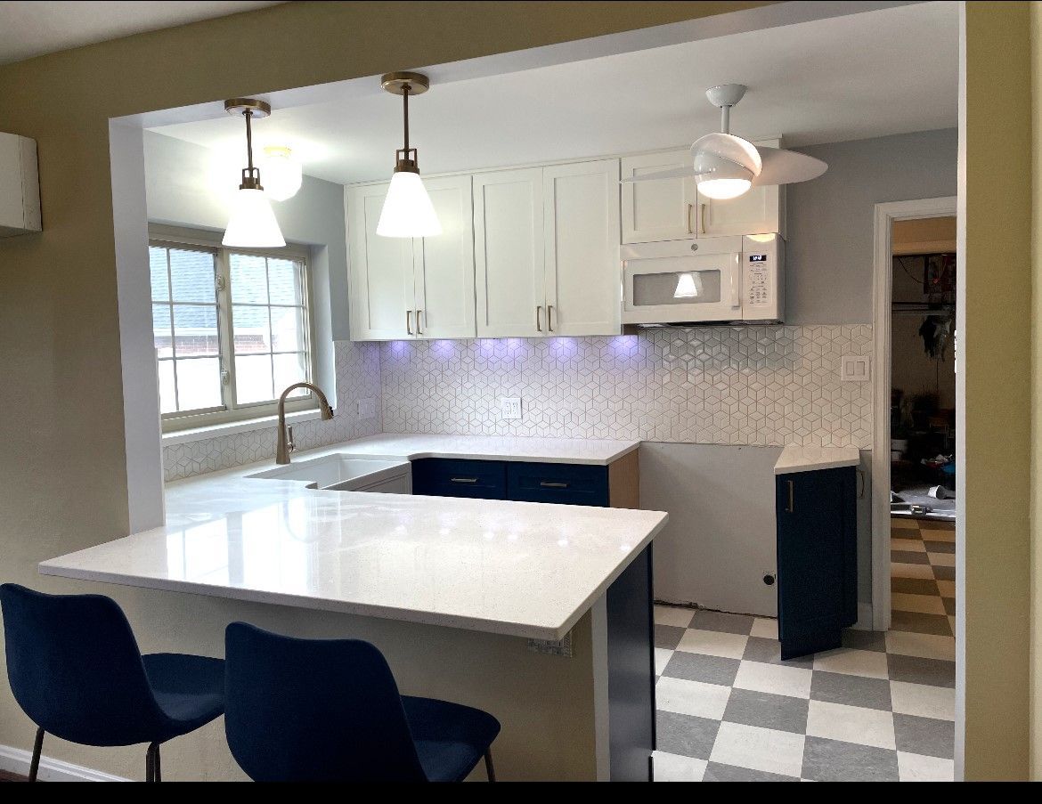 Kitchen by Freshlook Interiors and Exteriors LLC