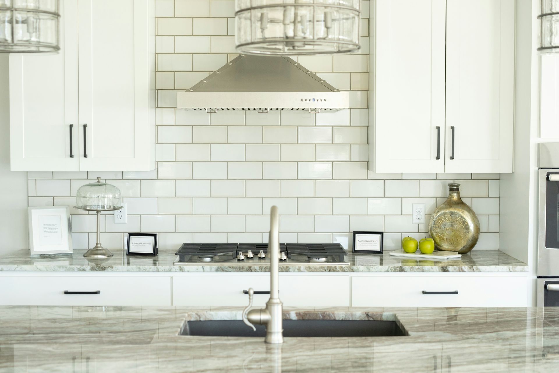 Kitchen Backsplash tile with island sink in front of it
