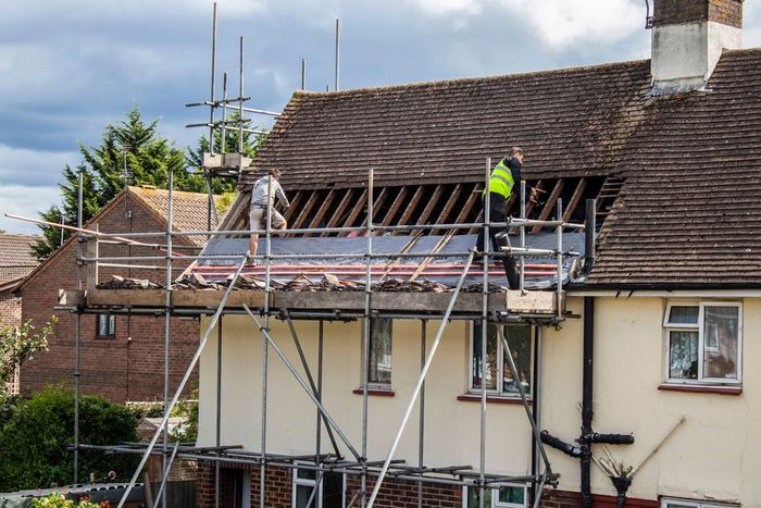 Professional Workers Removing Old Roof