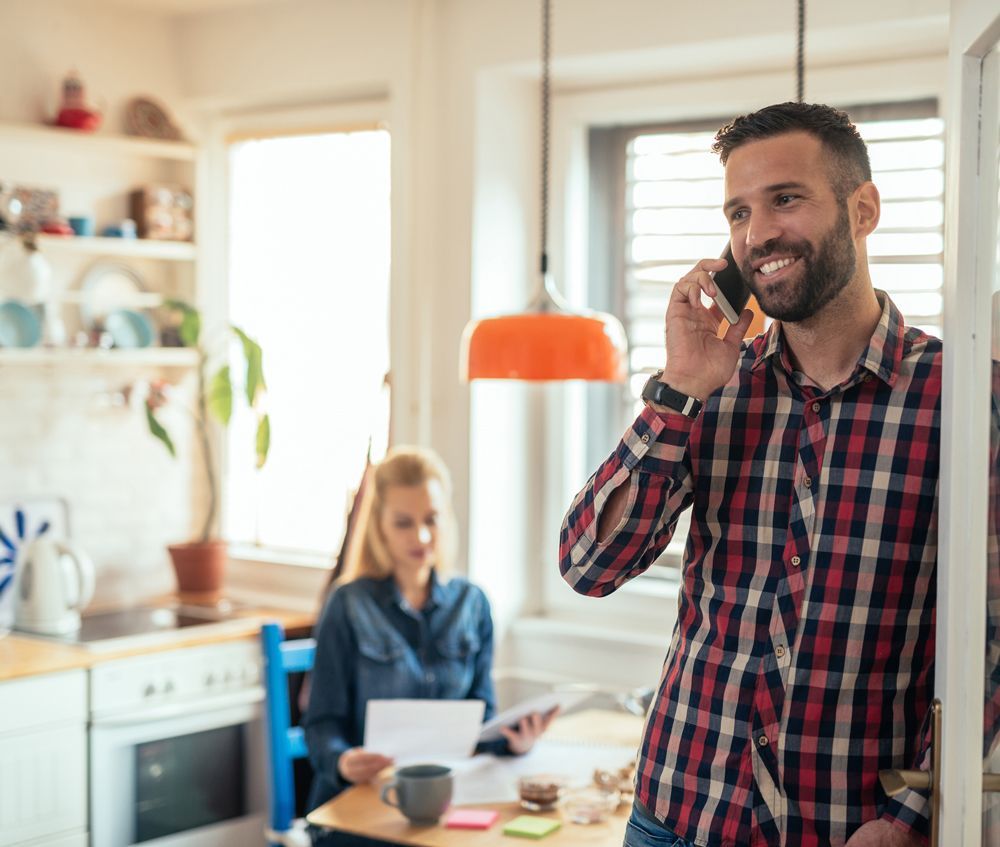 Man Calling for a Roof Estimate