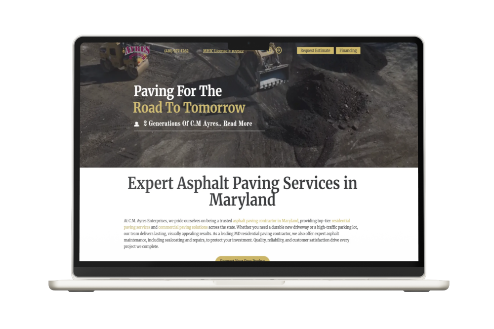 Laptop displaying a website for asphalt paving services, text: