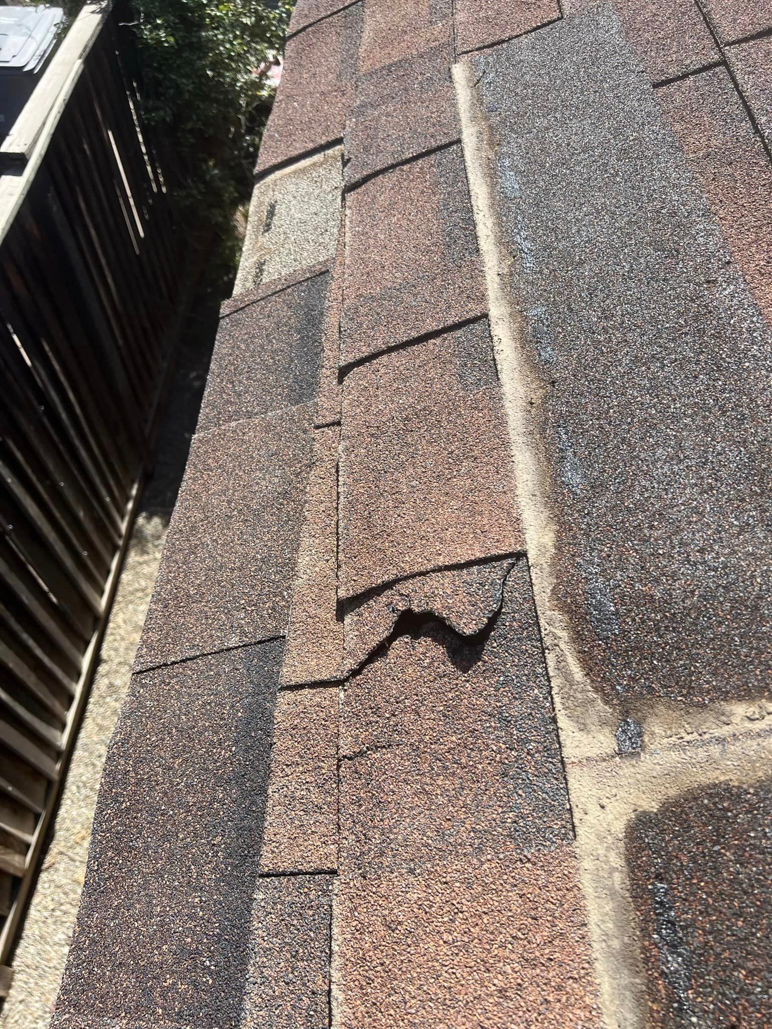 A close up of a roof with a hole in it.