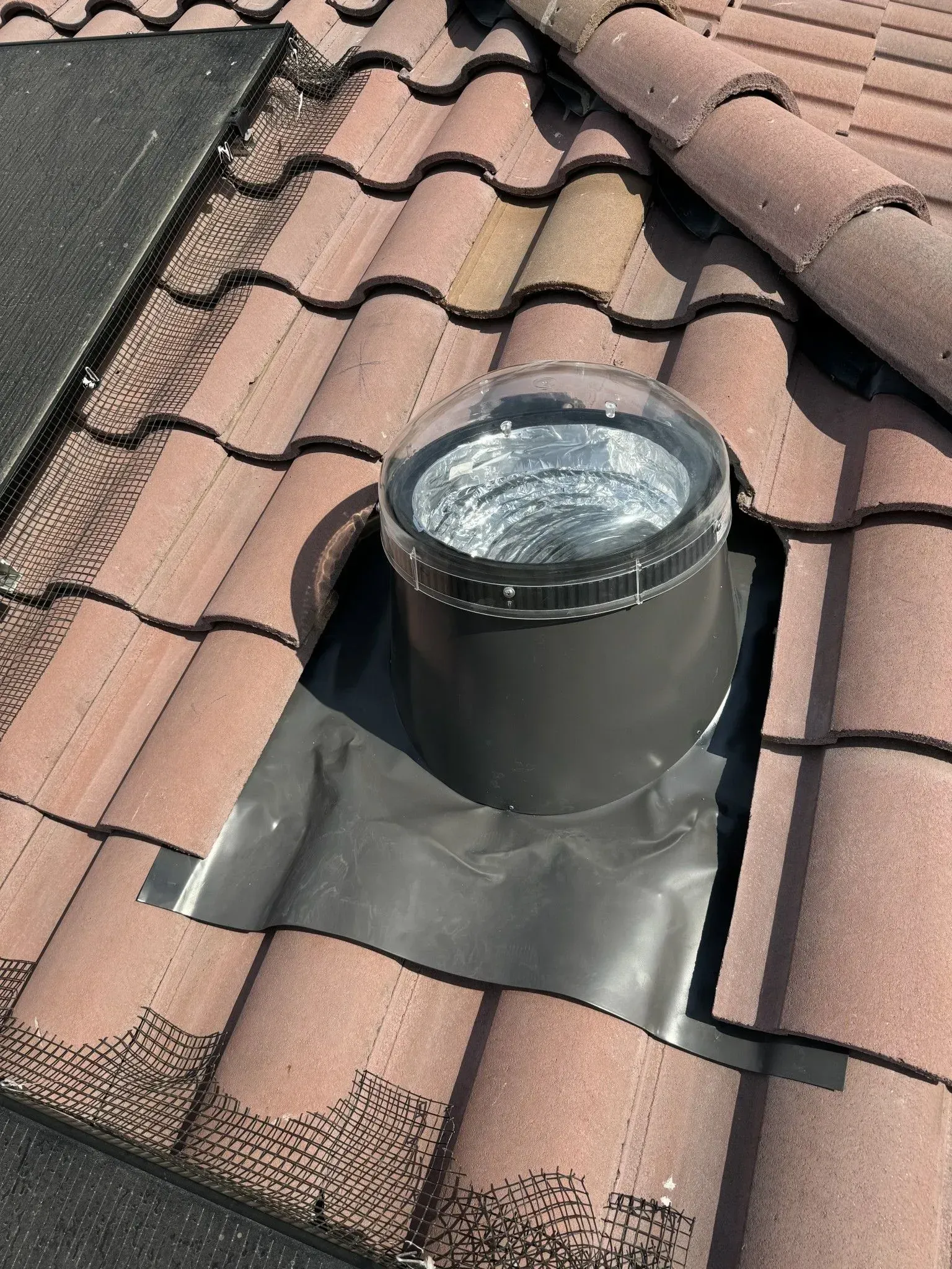 A roof with a light coming out of it