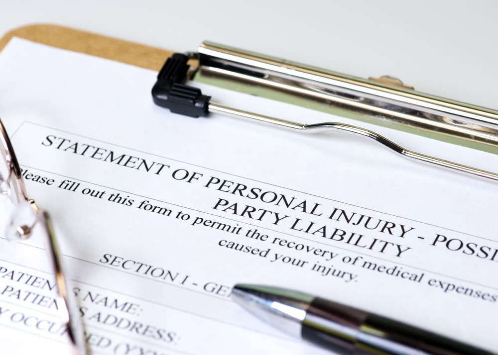 A Clipboard with A Statement of Personal Injury on It — Linda Emery & Associates In Gosford, NSW