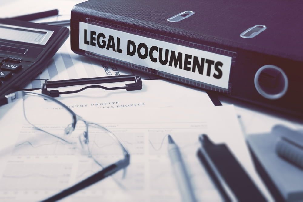 A Binder with The Word Legal Documents on It — Linda Emery & Associates In Gosford, NSW