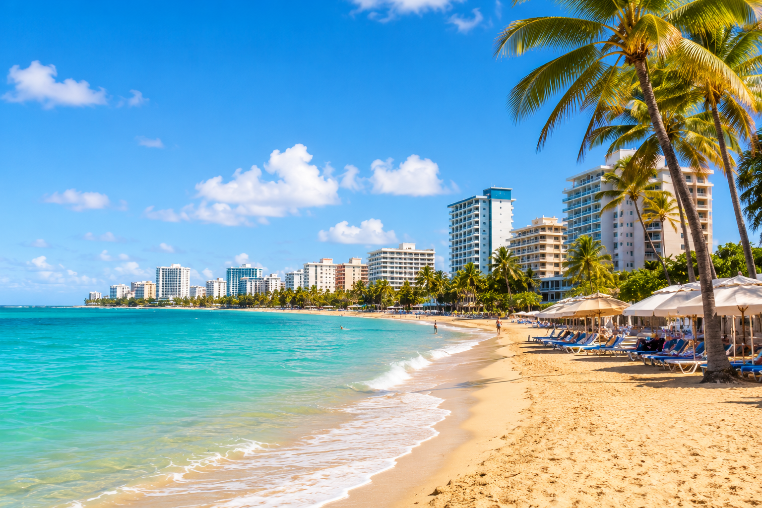 A view of the beautiful  Isla Verde beach with palm trees lining the sand.
